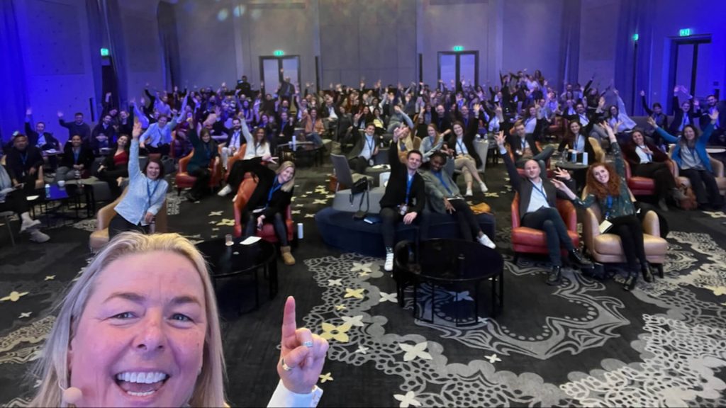 Rach Haslam hosting a live event from stage